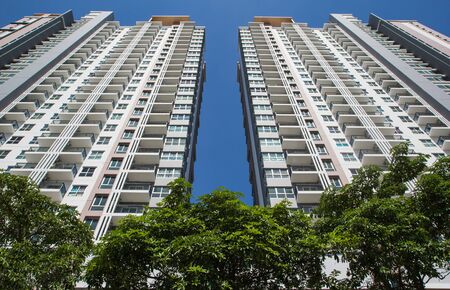 image of condo on afternoon with front side tree