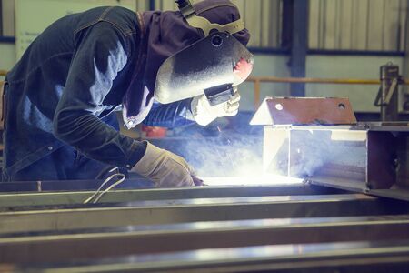 Male welding steel beam construction bridge structureの写真素材