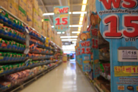 THAILAND, BANGKOK- MARCH 05, 2017: Billboard blurred image of supermarket shopping - product shelf...