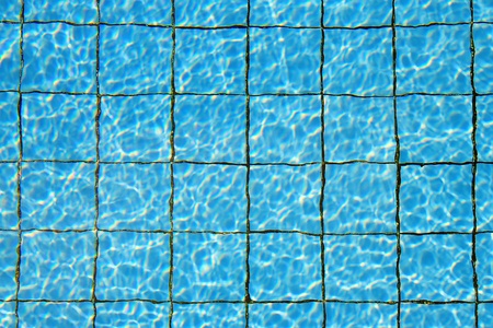 Swimming pool with stair at hotelの写真素材