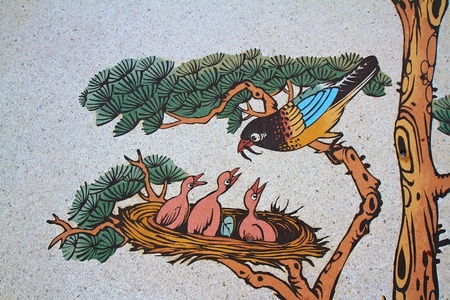 This bird feeding  painting on a wall in Chinese templeのeditorial素材