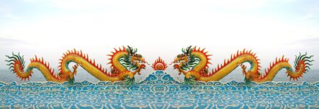 Two chinese dragon statue on the clouds.の写真素材