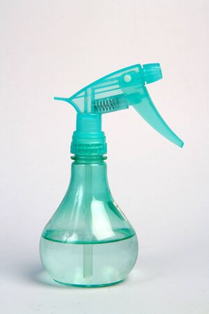 plastic water spray bottle isolated on whiteの写真素材