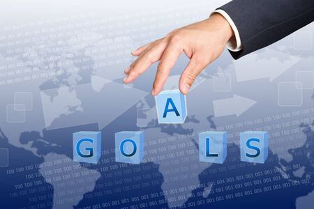hand of business man Hold  goals word buttons の写真素材