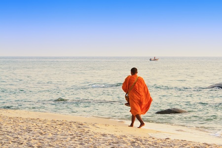  monks on the beach,Hua Hin Thailandの写真素材