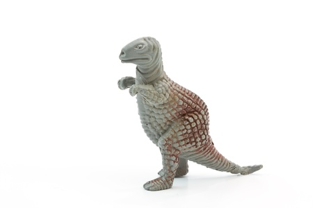 Toy plastic dinosaur on white baclgroundの写真素材