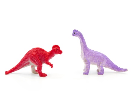 Toy plastic dinosaur on white baclgroundの写真素材