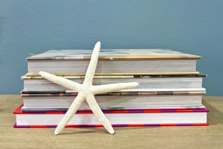 Old books and Starfishの写真素材