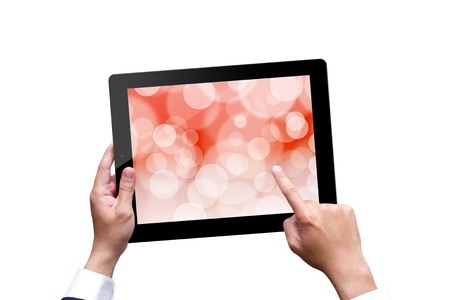 male hands holding a tablet isolated on whiteの写真素材