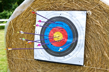 Archery target with arrowの写真素材