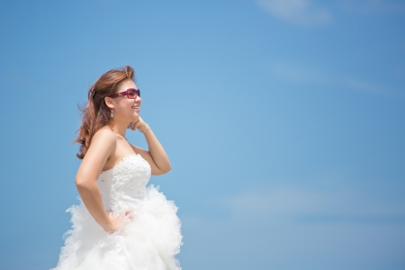 Bride smile at blue sky の写真素材