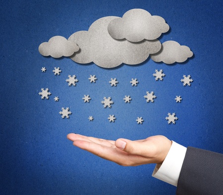 Cloud Weather  from paper background recycled on business handの写真素材