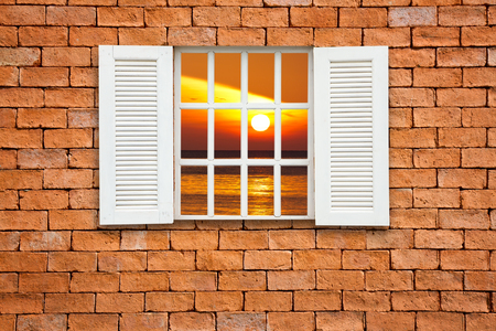  Red brick wall  with window seaviewの写真素材