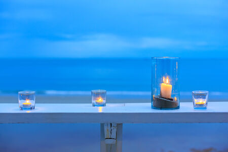 romantic  candles light on the sea の写真素材