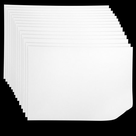 White paper pulled out from a notebook on a black backgroundの写真素材