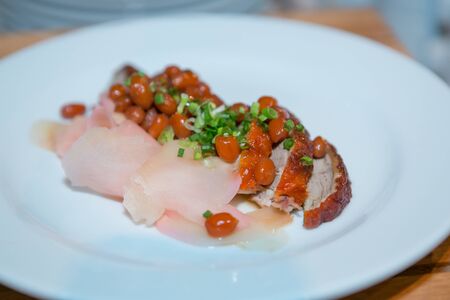 Roasted duck with sliced ??pickled ginger.の写真素材