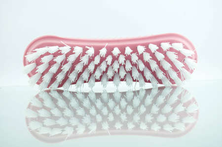 Pink brush washing  Placed on a white background の写真素材