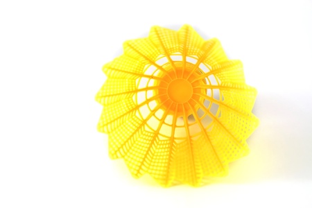 Yellow Shuttlecock on white background の写真素材