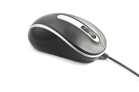 Close-up of simple wired computer mouse isolated on white background