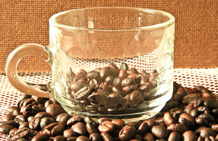 Coffee beans and glass of coffee.の写真素材