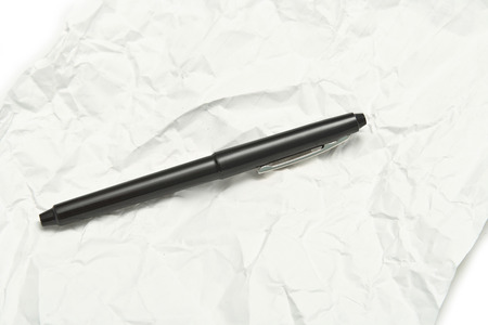 Black Pen on white note の写真素材