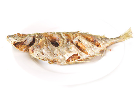 Fried fish on white background.の写真素材