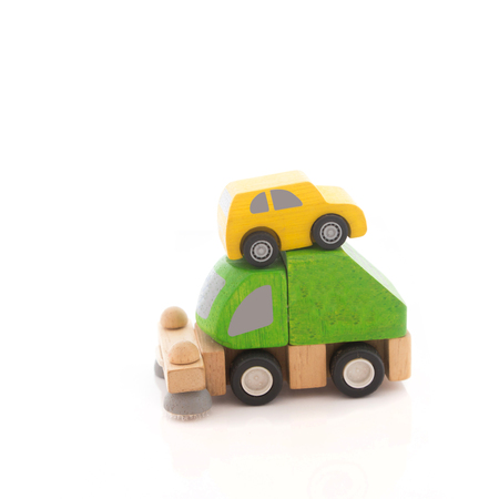 wooden car toy on white background.の写真素材