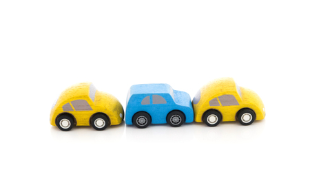wooden car toy on white background.の写真素材