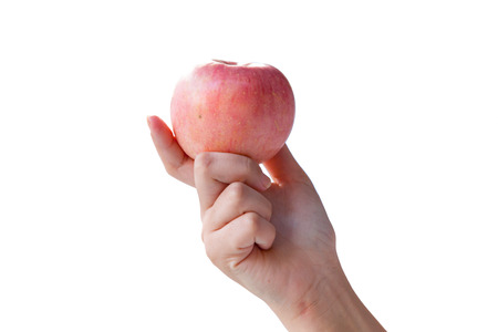 Apple in woman handの写真素材