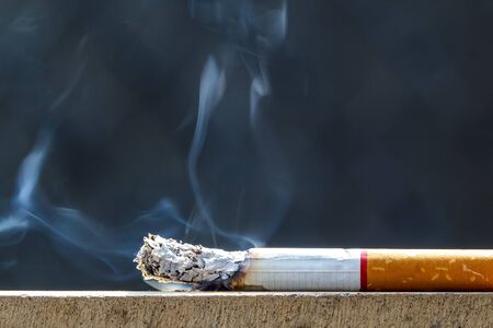 cigarette and smokeの写真素材