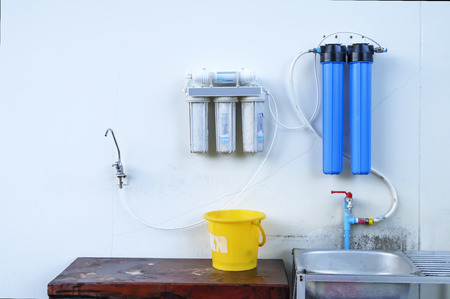 Great filters to purify your drinking water an image isolated in the kitchen interiorの写真素材