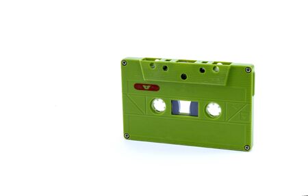 Vintage record player tape. Old audio cassette isolated on a white background.の写真素材