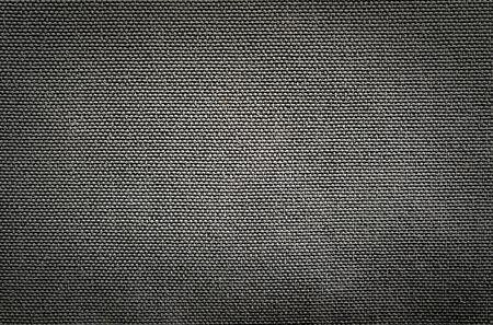 Black fabric texture background. Detail of canvas textile material.