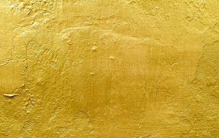 Gold background or textures and shadows, old walls and scratchesの写真素材