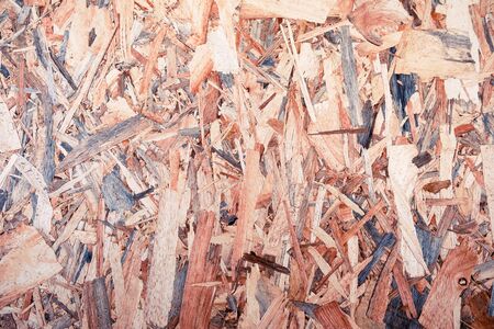 OSB boards are made of brown wood chips sanded, for backdrop and background