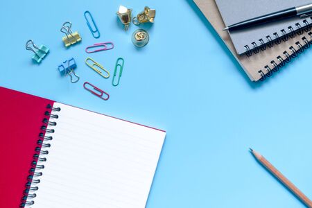 School and office supplies on a white blue background, Top view.