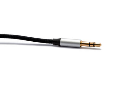 Black aux audio cable isolated on white background.の写真素材