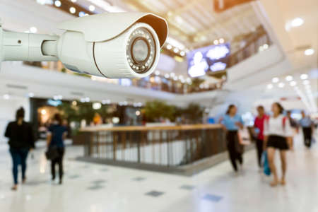 CCTV security with shop store blurred background. Abstract blurred department storeの写真素材