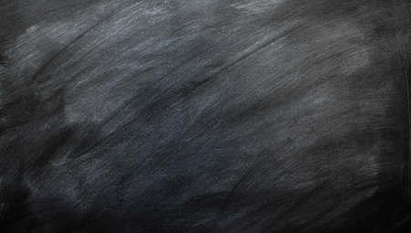 Abstract Chalk rubbed Blackboard / chalkboard texture. Empty blank black chalkboard with chalk traces, Education concept,の写真素材