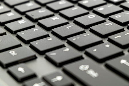 Close up of black keyboard of a modern laptop, Selective focus keyboard background