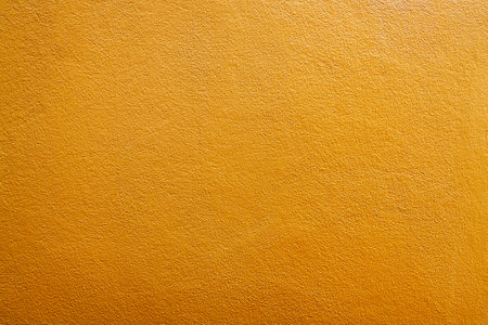 Yellow wall texture background. wall backdrop yellow.の写真素材