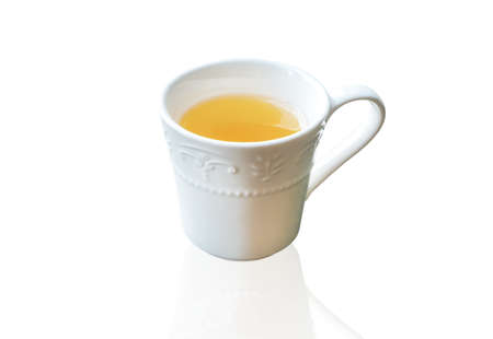White mug of hot teaの写真素材