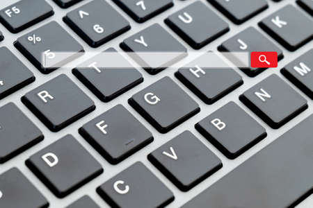 Searching browsing internet data information on network computer. With a backdrop or background as a modern computer keyboard. Concept technology Searching dataの写真素材