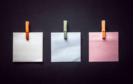 Abstract paper note on black background. Blank notes for add text message or design website.