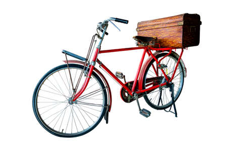 Old vintage red bicycle and old box vintage, isolated on white background.の写真素材