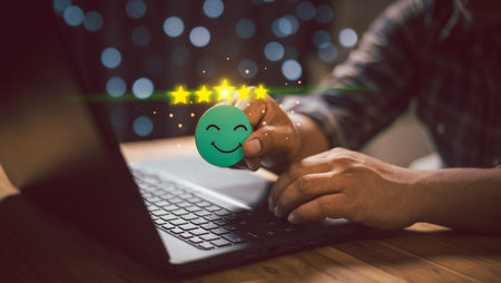 Customer review satisfaction feedback survey concept, Businessman using hand holding to tick sign on virtual smiley face for client evaluation product and service best quality, Satisfaction, feedbackの写真素材