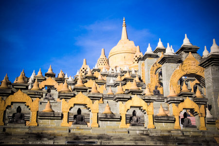 sandstone castle and blue sky in thailandの写真素材