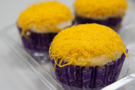 cup cake and yellow sweet dessert on topの写真素材