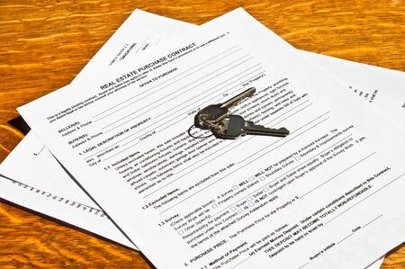 Contract to purchase a home with keys ready. The market seems to be rebounding.の写真素材
