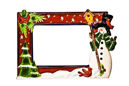 A decorative ceramic Christmas frame with snowman.の写真素材